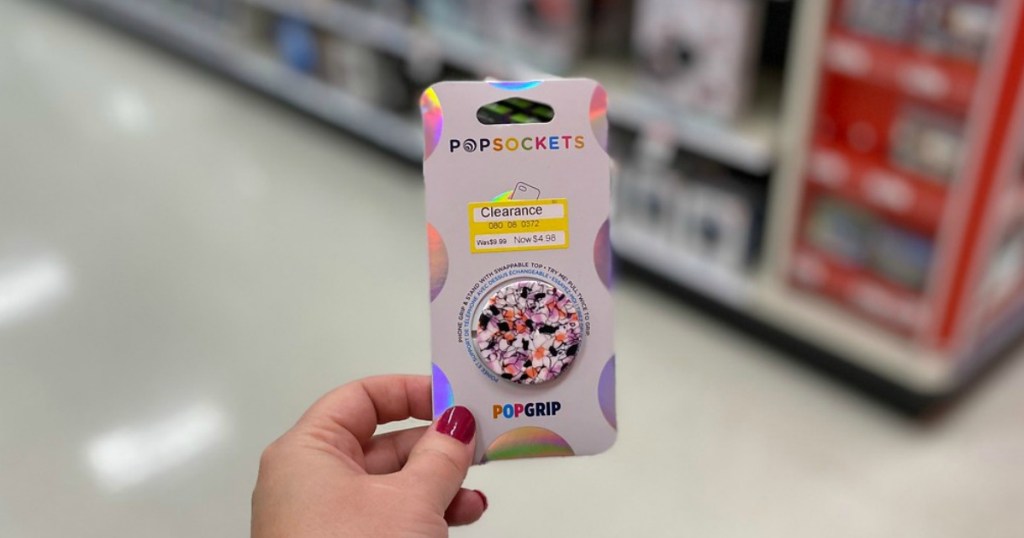 hand holding popsocket in a store
