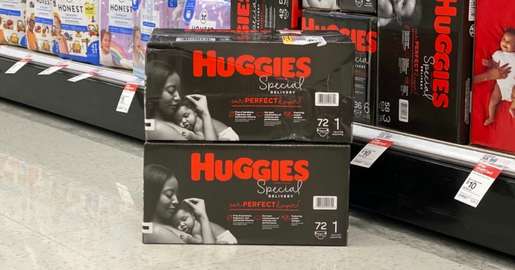 boxes of diapers stacked on a store floor