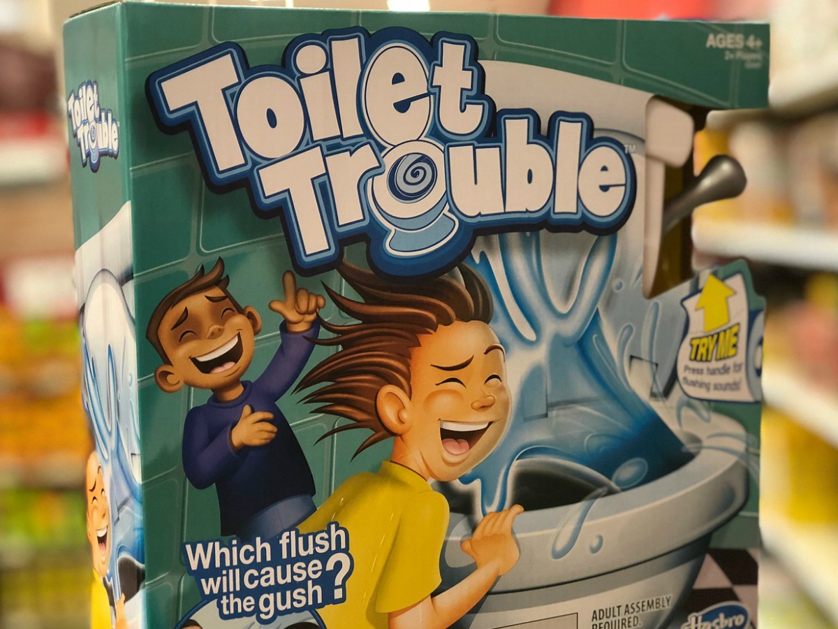 game with toilet and kid on it by store aisle