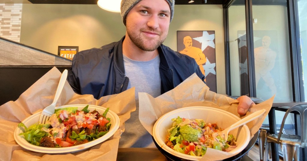 two qdoba meals with male