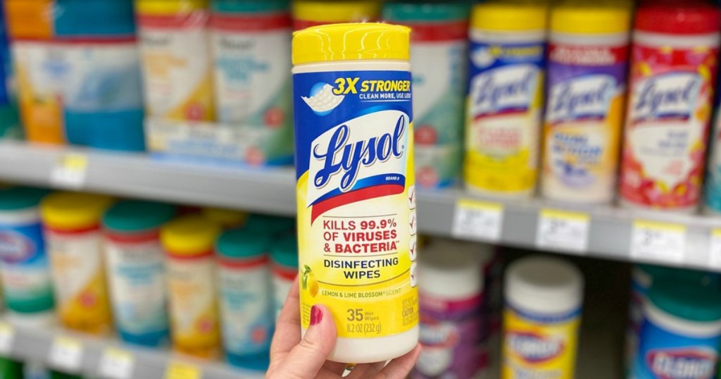 hand holding disinfectant wipes in a store
