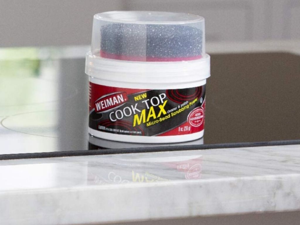 tub of cook top cleaner on counter top