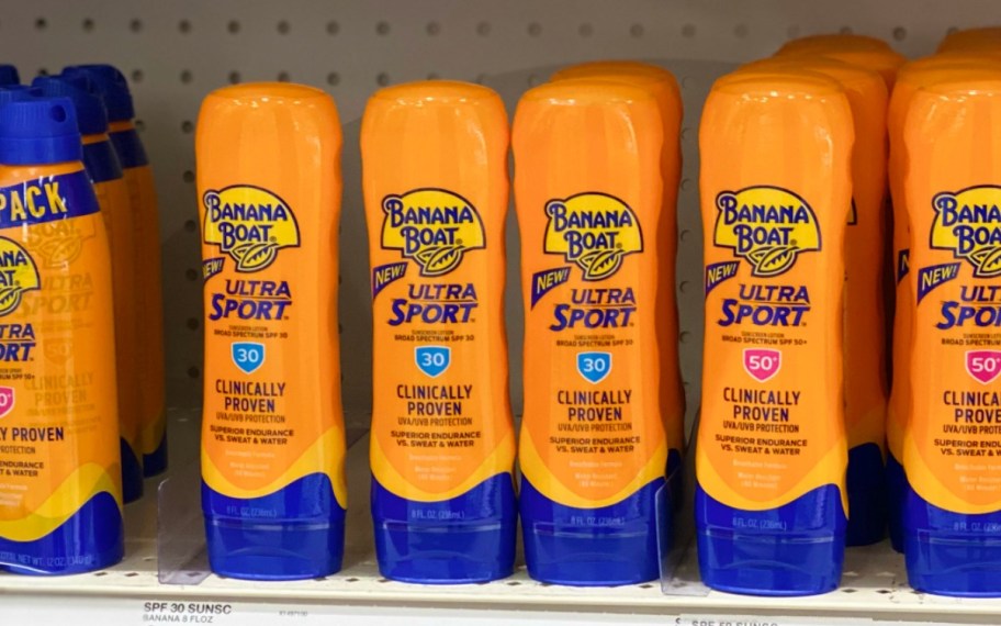 In-store display of sunscreen in orange bottles