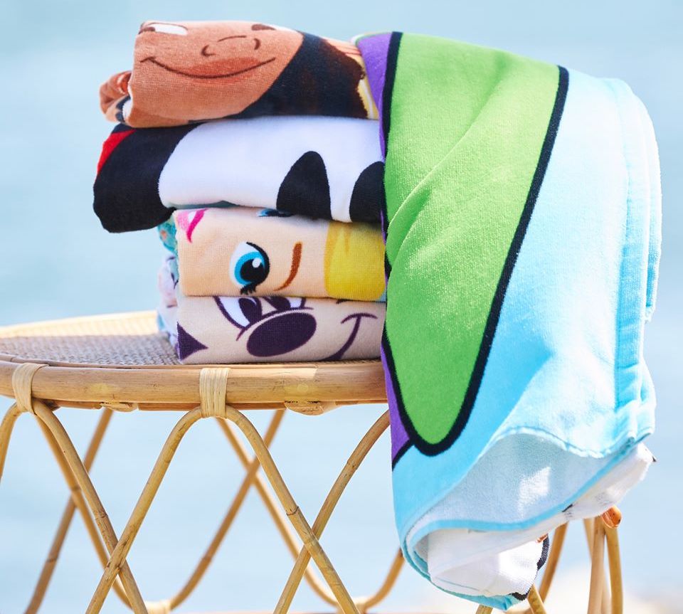 stack of beach towels on a table