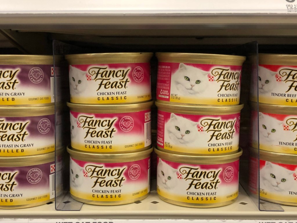 cat food cans on store shelf