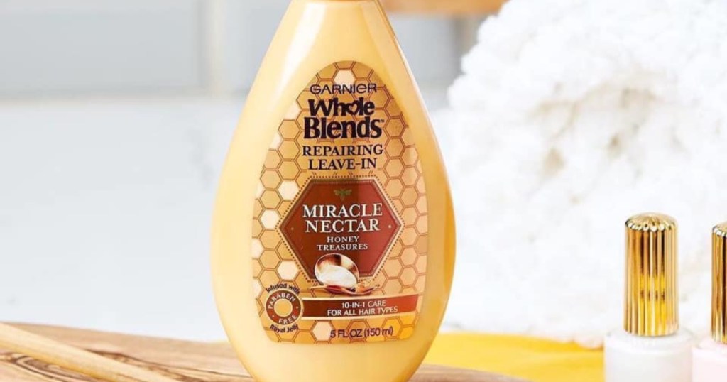 Garnier Whole Blends Miracle Nectar Repairing Leave-In Treatment on counter