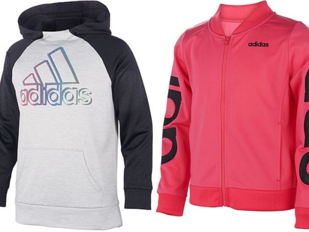 two girls adidas clothing items - one hooded sweatshirt and one full zip jacket 