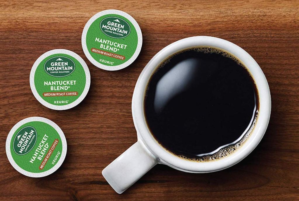 cup of coffee next to k-cups