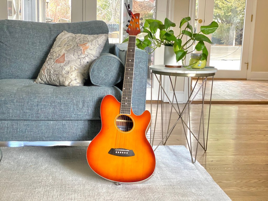 Guitar Resting on Couch