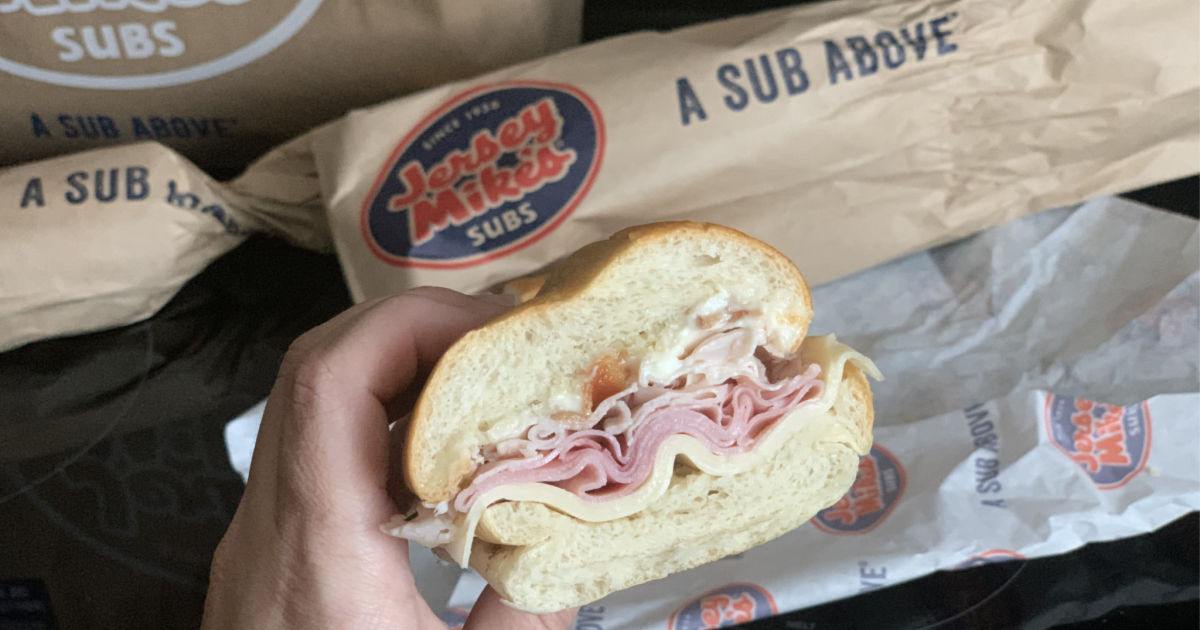 hand holding jersey mikes club sub