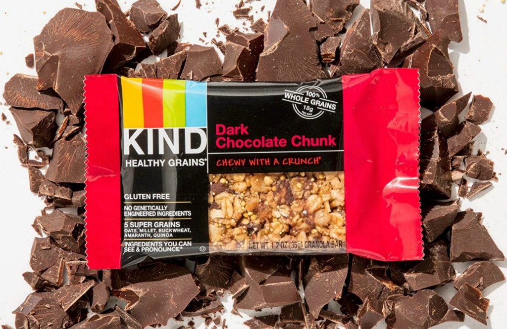 KIND Healthy Grains Dark Chocolate Chunk Bar over chopped chocolate