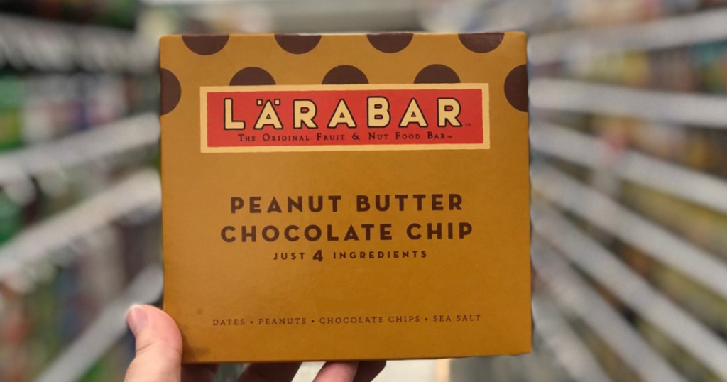 hand holding up box of Larabar Peanut Butter Chocolate Chip Bar