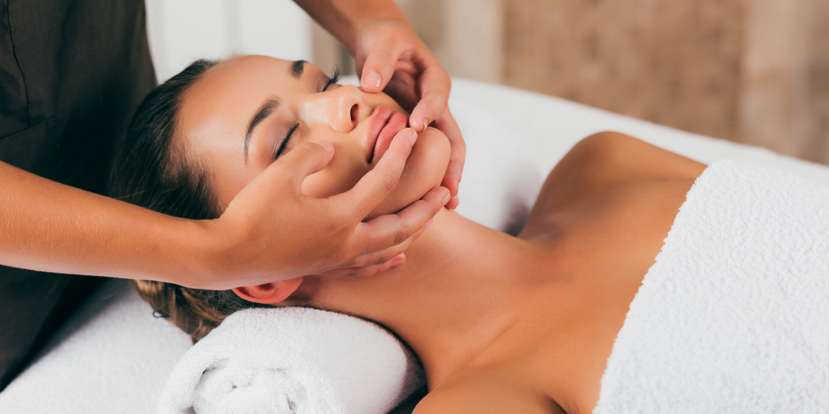 Woman getting face massage