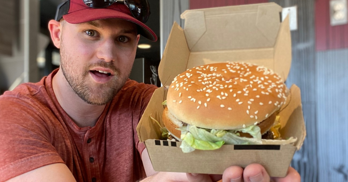 Man holding a McDonalds Big Mac