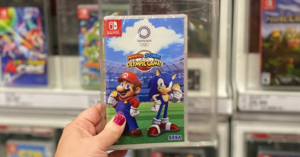 hand holding the Mario & Sonic Olympic Games game