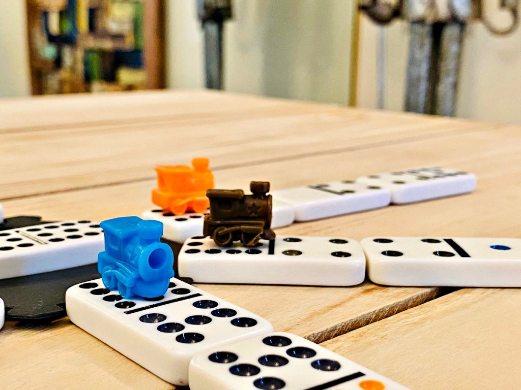 Mexican Train Domino Game with trains on tiles