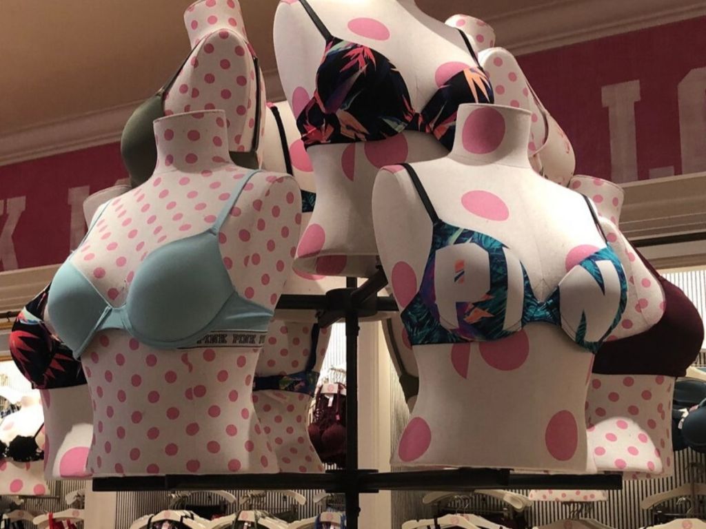 Mannequins wearing bras on display at store 