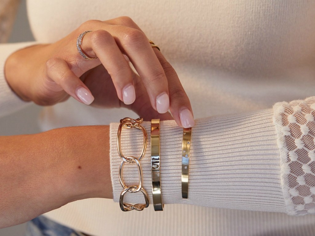 Woman wearing gold bracelets from Rocksbox Jewelry