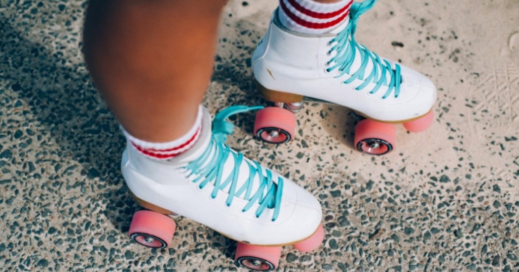 roller skates on sandy pavement