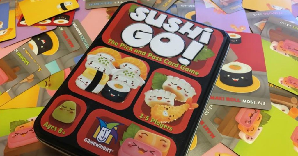 Sushi go game box sitting on cards