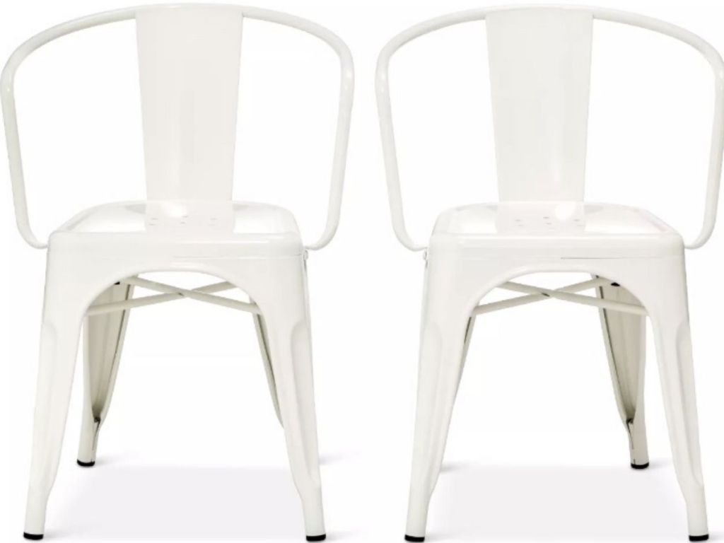 two metal high back chairs