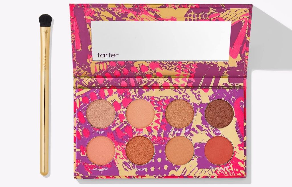 Tarte palette with a brush next to it