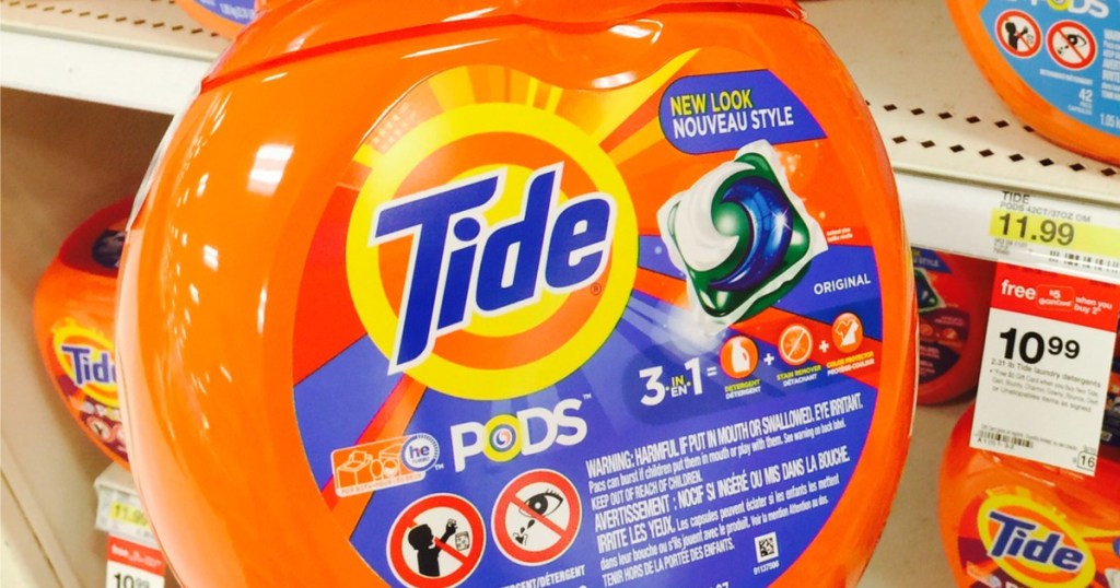 tub of laundry detergent pods in front of store shelf