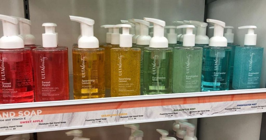 store shelf displaying several hand soaps in pump bottles
