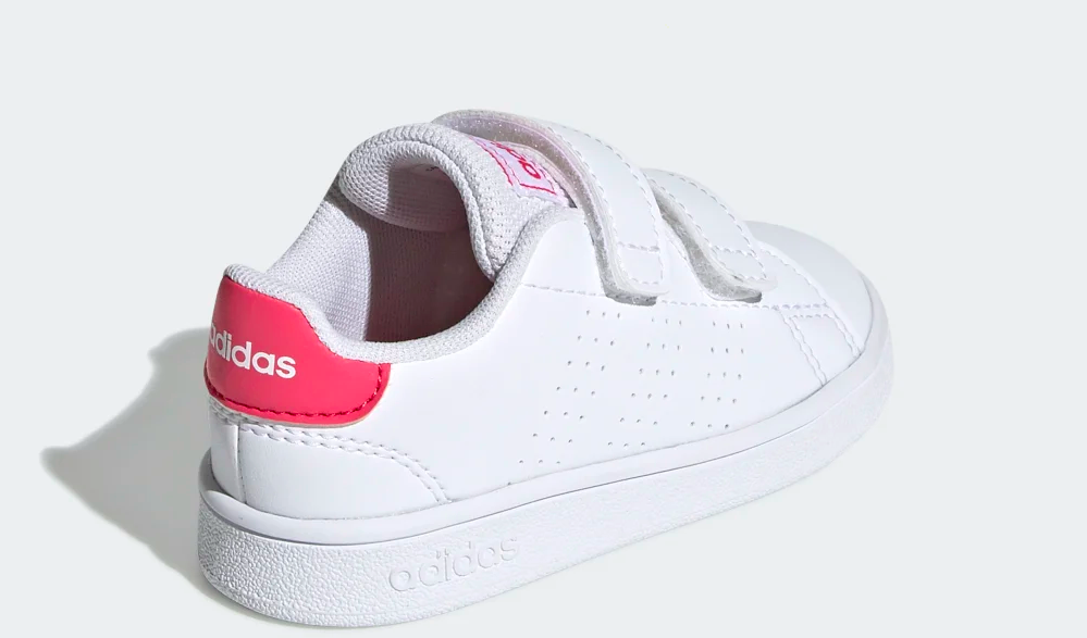 white and pink adidas kids shoe