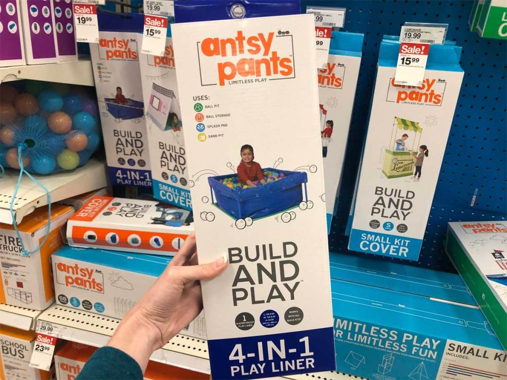 hand holding antsy pants build and play ball pit