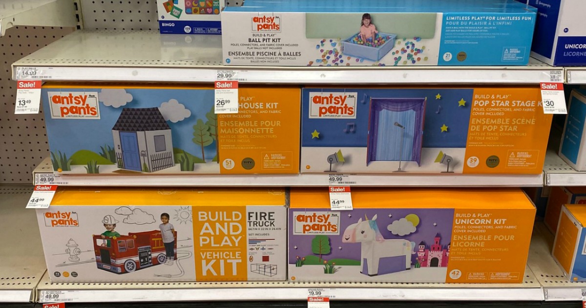 build and play sets on a Target store shelf - unicorn, firetruck, house, ball pit