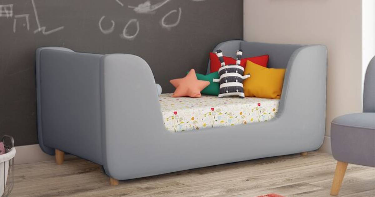 gray fabric toddler bed with wooden legs