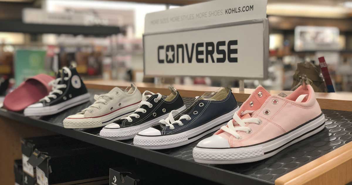 converse shoes on display in a store