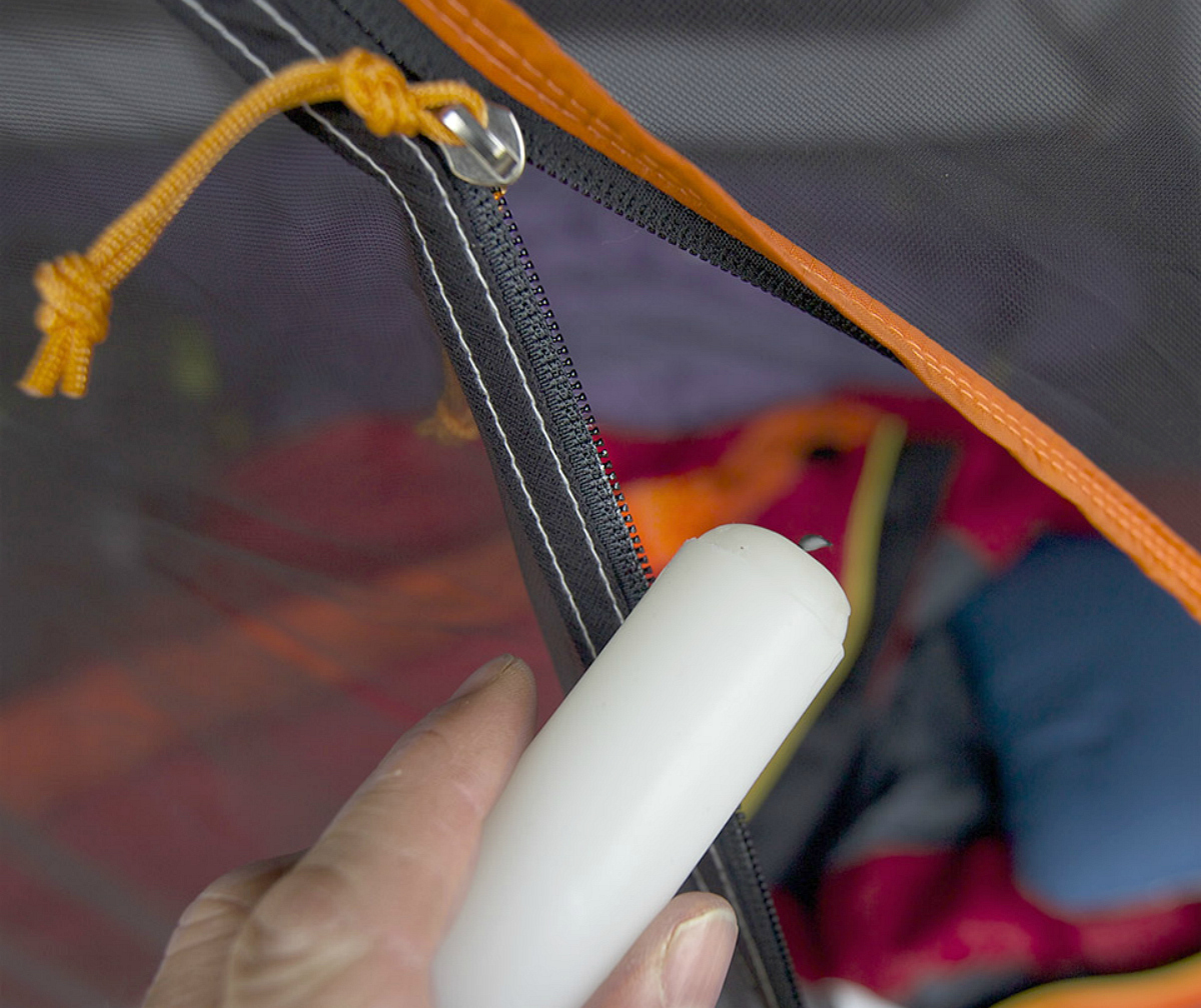 using candle on tent zipper
