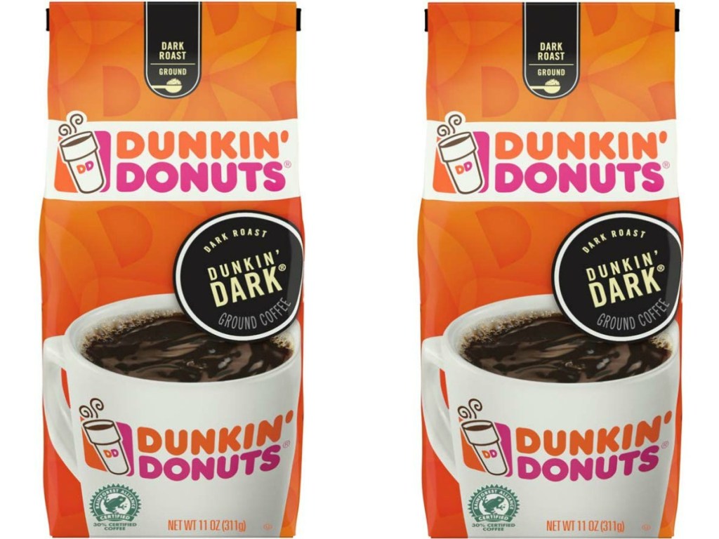 two bags of coffee from dunkin on white background