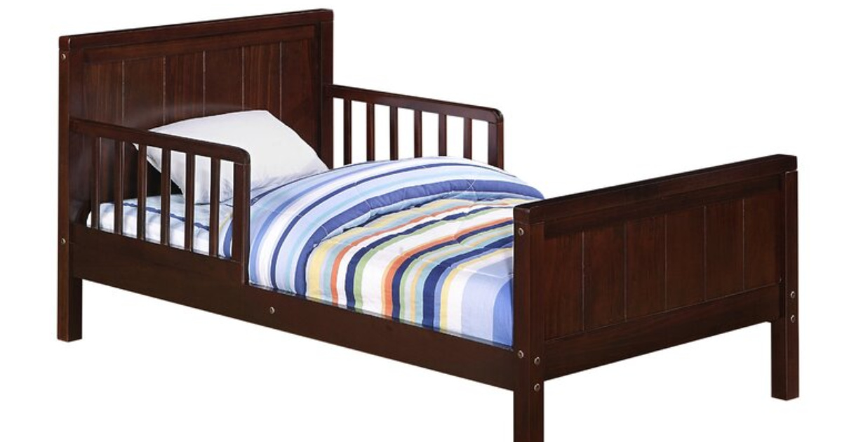 brown wooden toddler bed
