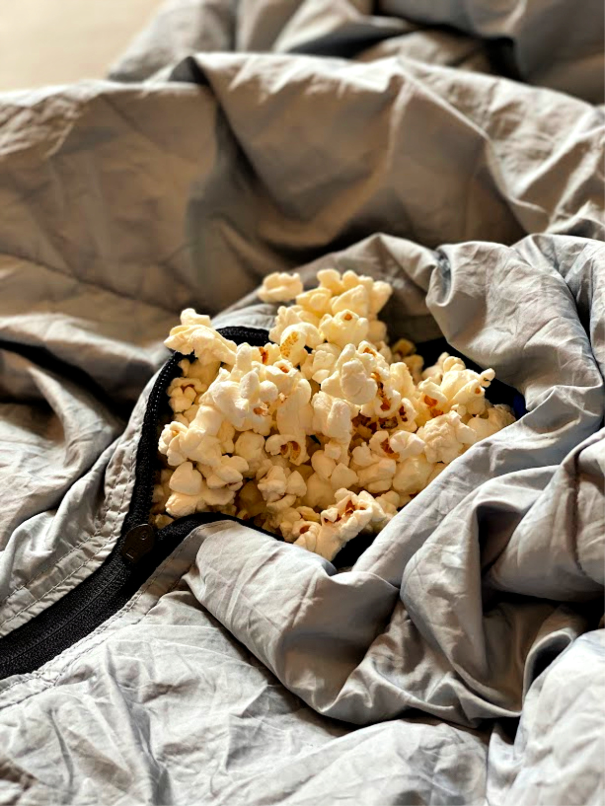 gray-blanket-filled-with-popcorn