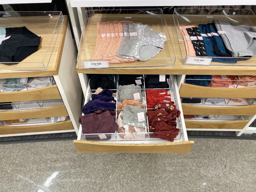 store display target with drawers filled with folded women's underwear