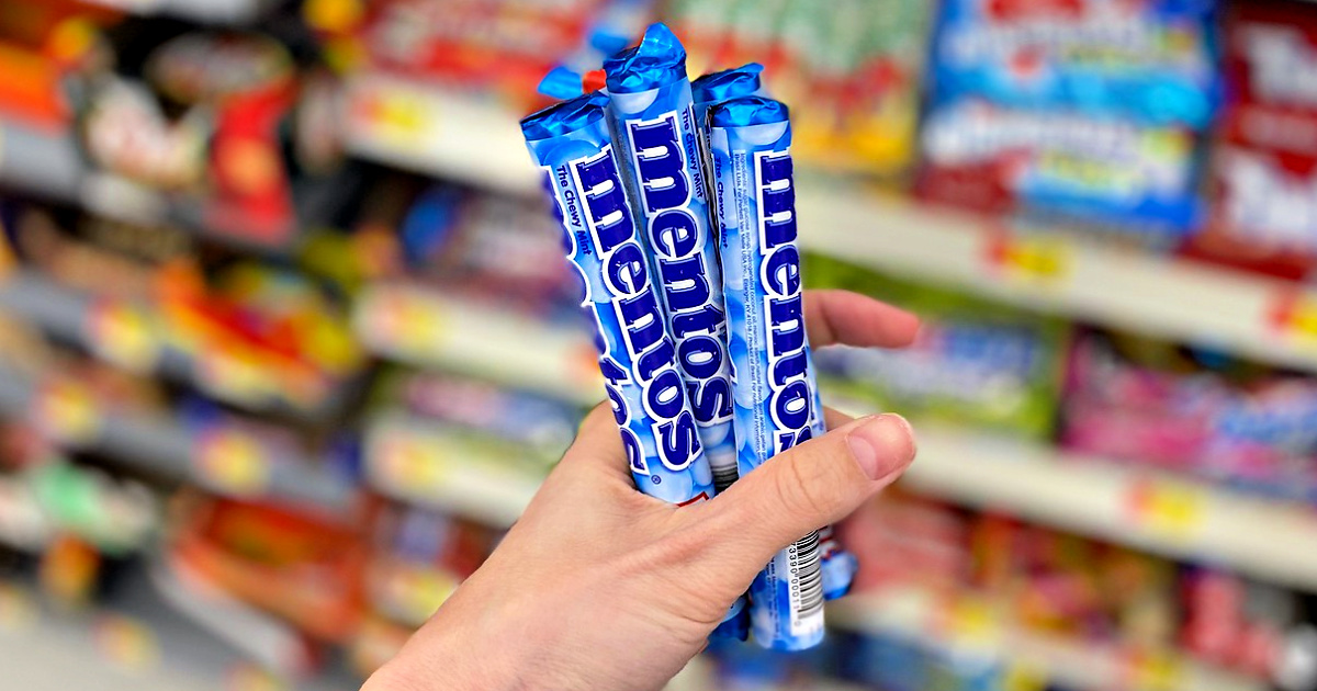 mentos mints in hand at store