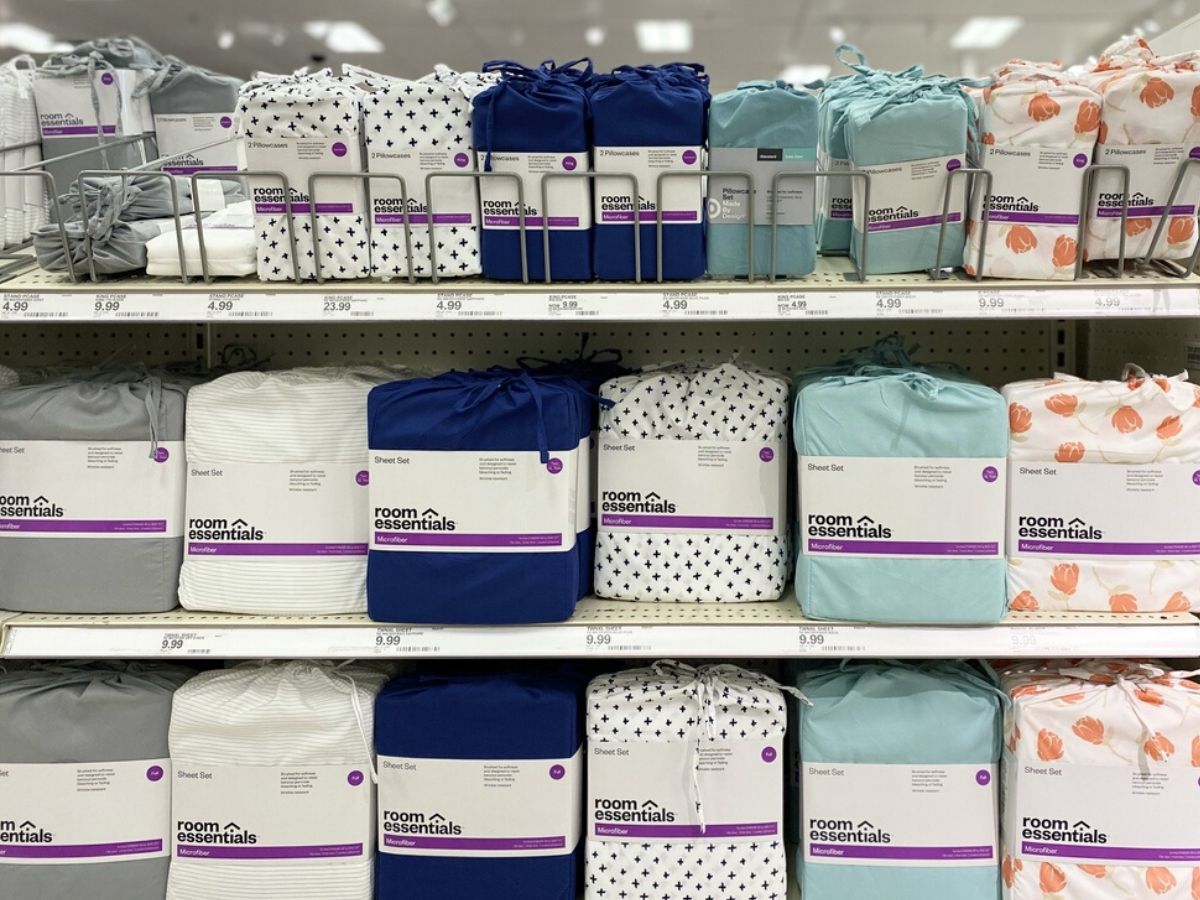 store shelves with new pillowcase sets and sheet sets in bags