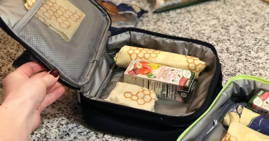 Lunch box with food wrapped in bees wraps