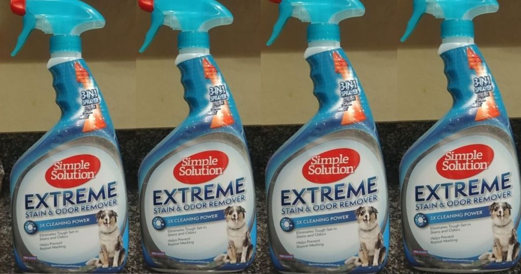 four bottles of pet odor and stain remover on counter
