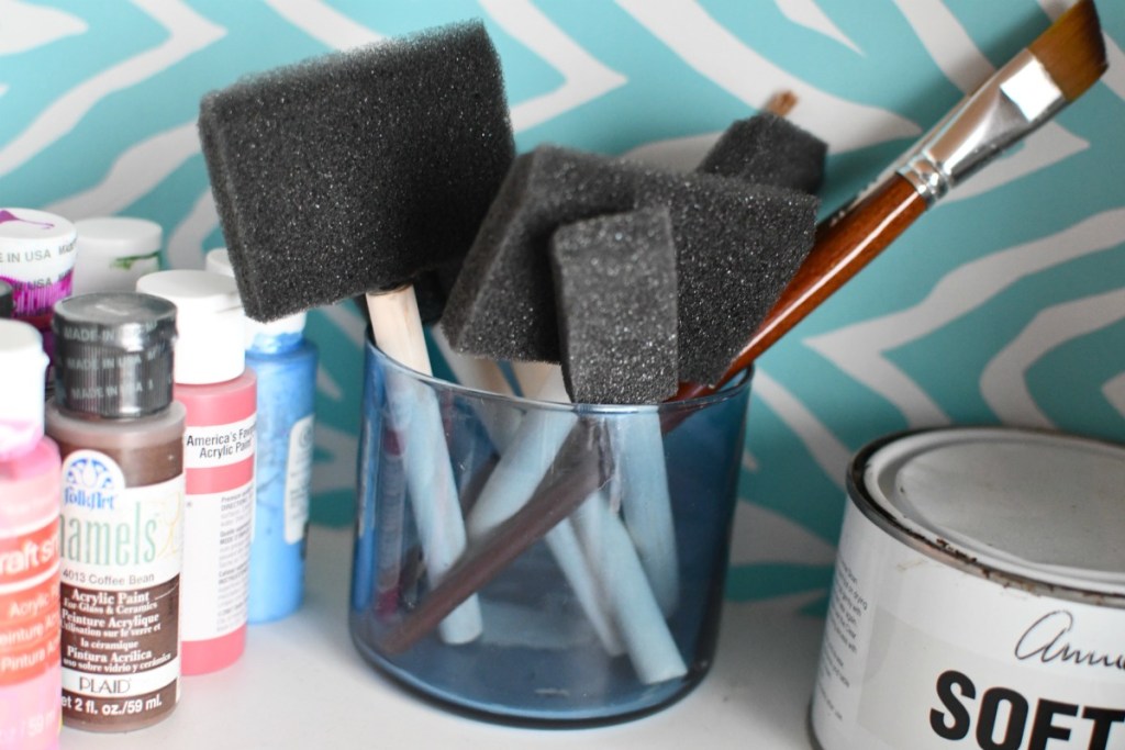 storing paint brushes in a bath and bodyworks candle jar