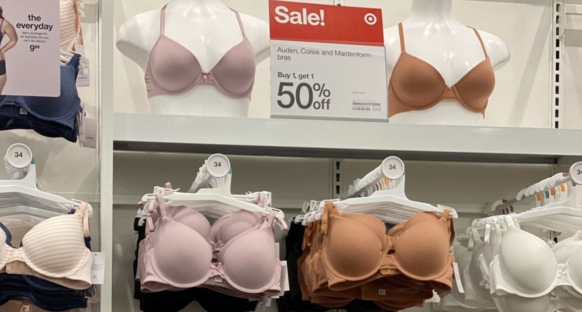 store display of bras and mannequin tops wearing bras