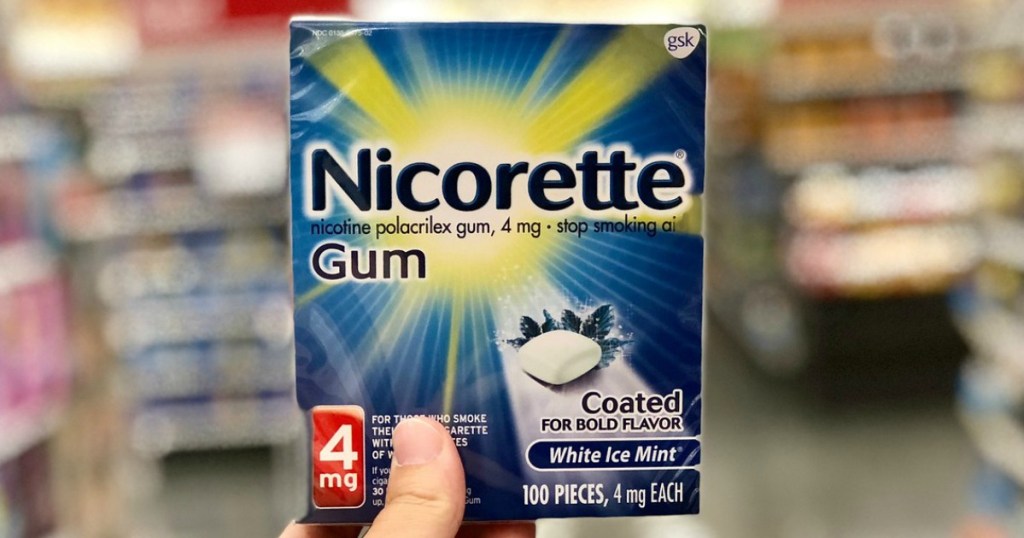 hand holding nicotene gum in a store