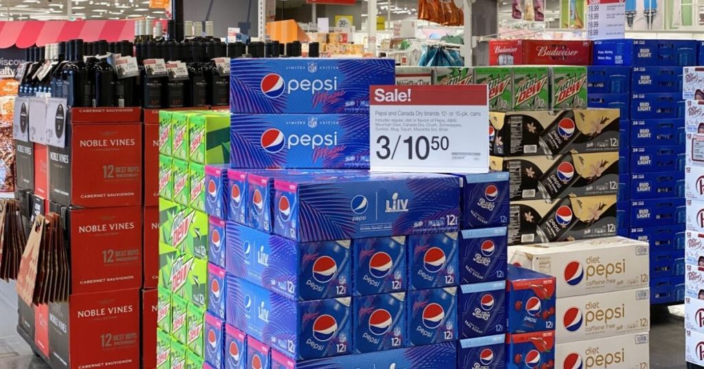store display of 12 packs can filled boxes of soda