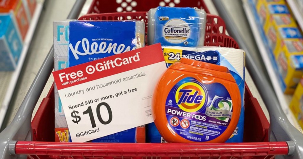 laundry detergent and paper products in a store shopping cart