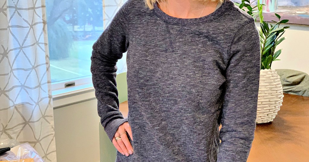 woman wearing Tek Gear Sweatshirt