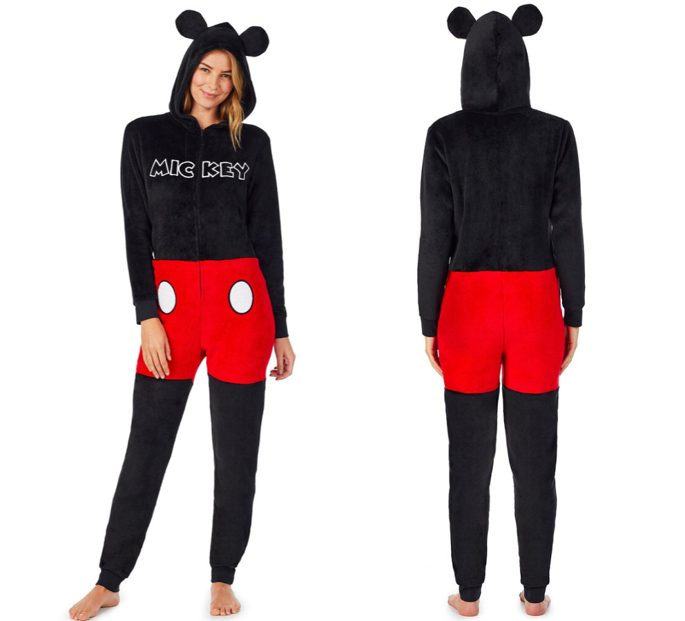 woman wearing mickey pajamas with mickey ears hoodie and red shorts