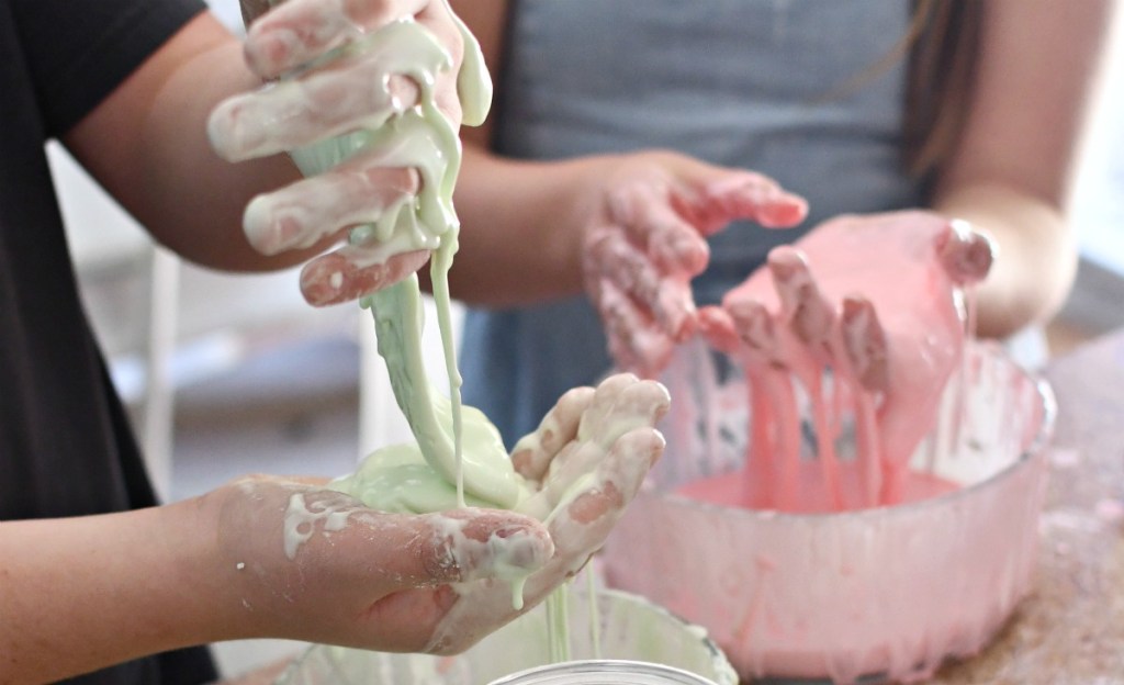 2 kids playing with Oobleck